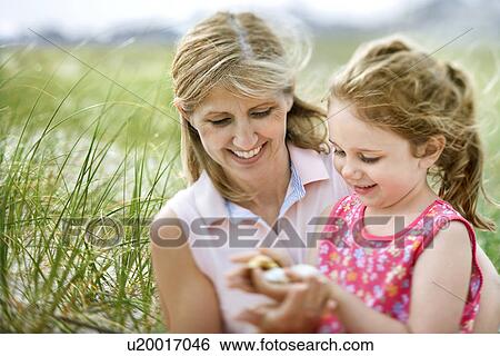 Stock Photograph - Mother and Daughter at the Beach. Fotosearch