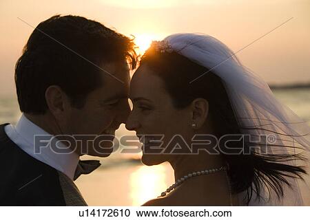 Newlywed Couple on Beach View Large Photo Image Stock Image - Newlywed Couple on Beach. Fotosearch