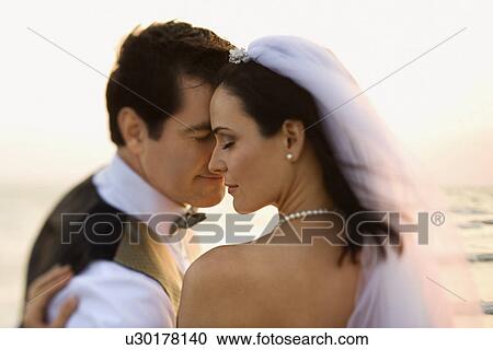 Newlywed Couple on Beach View Large Photo Image Stock Image - Newlywed Couple on Beach. Fotosearch