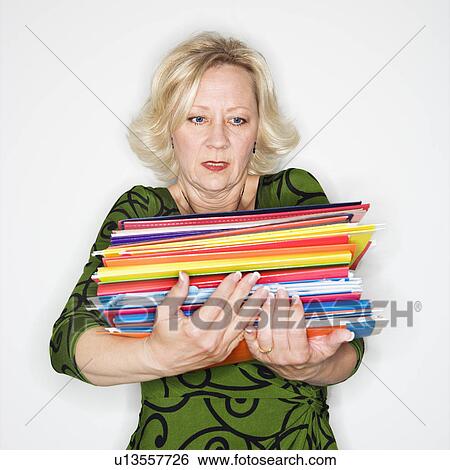 Stock Photograph - Overworked businesswoman. Fotosearch