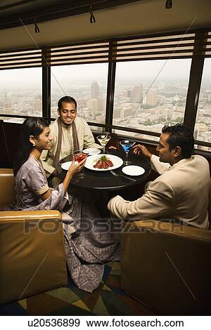 People Conversing in Restaurant View Large Photo Image Stock Photo - People Conversing in Restaurant. Fotosearch