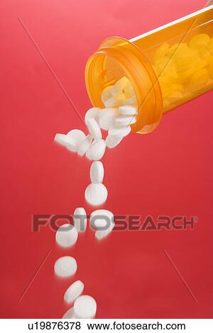 Pills Pouring From a Container View Large Photo Image Stock Photo - Pills Pouring From a Container. Fotosearch