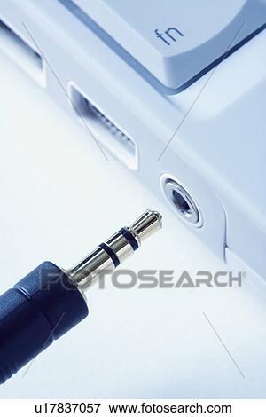 Plug Connecting to Laptop Computer. View Large Photo Image Stock Photo - Plug Connecting to Laptop Computer.. Fotosearch