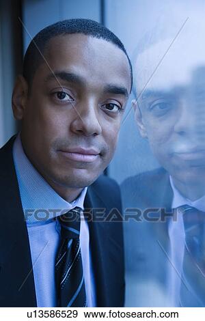 Portrait of Businessman and His Reflection View Large Photo Image Stock Photo - Portrait of Businessman and His Reflection. Fotosearch