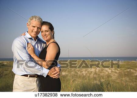 Stock Photo - Portrait of Couple on Beach. Fotosearch