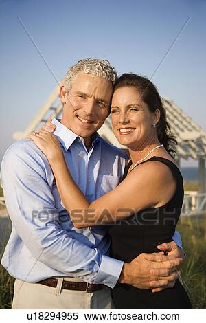Stock Photography - Portrait of Couple on Beach. Fotosearch