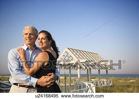 Stock Photography - Portrait of Couple on Beach. Fotosearch