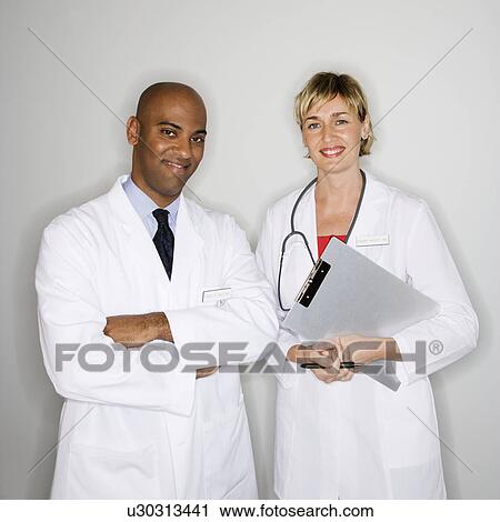 Stock Image - Portrait of doctors. Fotosearch