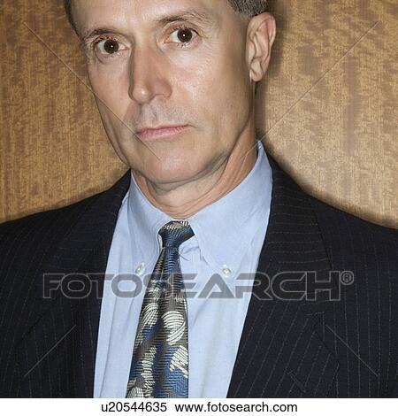 Stock Photography - Portrait of Serious Businessman. Fotosearch