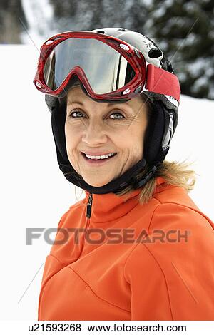 Stock Photo - Portrait of Smiling Female Skier. Fotosearch