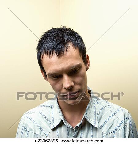 Stock Photography - Portrait of young man. Fotosearch