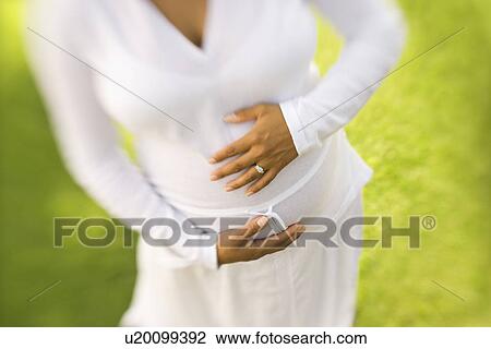Pregnant Woman in Outdoor Setting View Large Photo Image Stock Image - Pregnant Woman in Outdoor Setting. Fotosearch