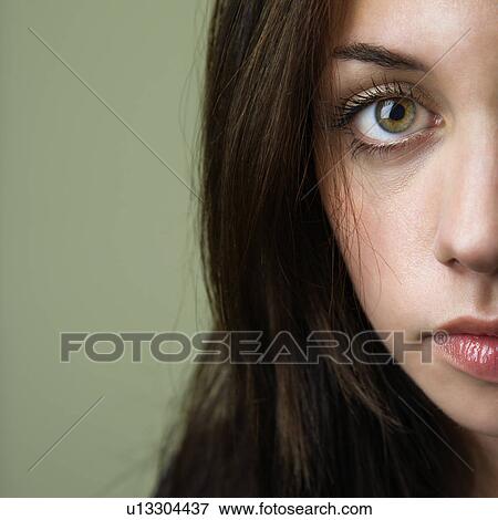 Stock Photo - Pretty young brunette woman. Fotosearch