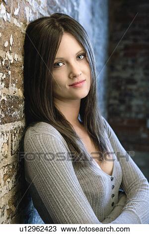 Stock Image - Pretty young woman portrait. Fotosearch