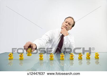 Stock Photo - Putting business in order. Fotosearch