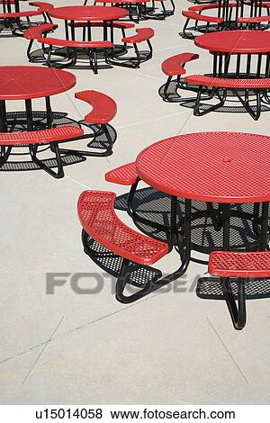 Stock Photo - Red Circular Cafeteria Tables. Fotosearch