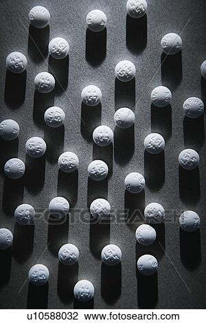 Stock Image - Round White Pills. Fotosearch