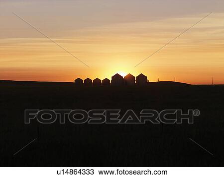 Row of Houses Silhouetted at Sunset View Large Photo Image Stock Image - Row of Houses Silhouetted at Sunset. Fotosearch