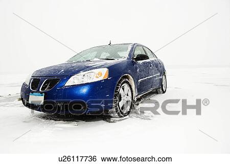 Sedan Parked on Ice sheet View Large Photo Image Stock Photograph - Sedan Parked on Ice sheet. Fotosearch