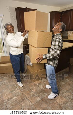 Senior Couple With Moving Boxes View Large Photo Image Stock Image - Senior Couple With Moving Boxes. Fotosearch