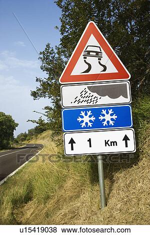Signs on a Rural Road in Italy View Large Photo Image Stock Photo - Signs on a Rural Road in Italy. Fotosearch