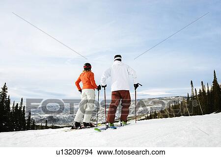 Skier Couple on Mountain View Large Photo Image Picture - Skier Couple on Mountain. Fotosearch