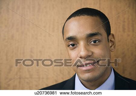 Stock Image - Smiling Businessman. Fotosearch