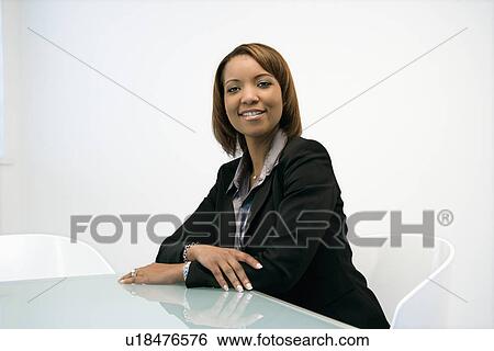 Stock Photograph - Smiling businesswoman portrait. Fotosearch