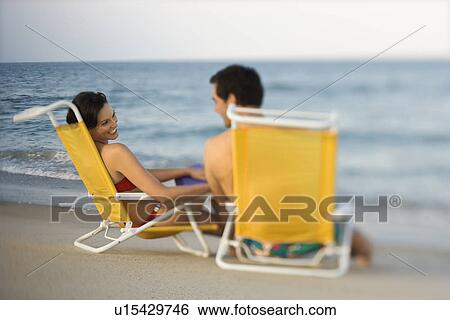 Smiling Couple on Beach View Large Photo Image Stock Photograph - Smiling Couple on Beach. Fotosearch