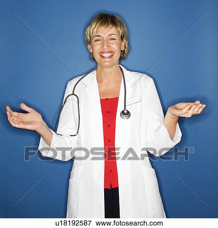 Smiling doctor View Large Photo Image Stock Photo - Smiling doctor. Fotosearch