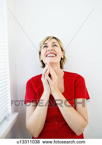 Stock Photo - Smiling happy woman.. Fotosearch