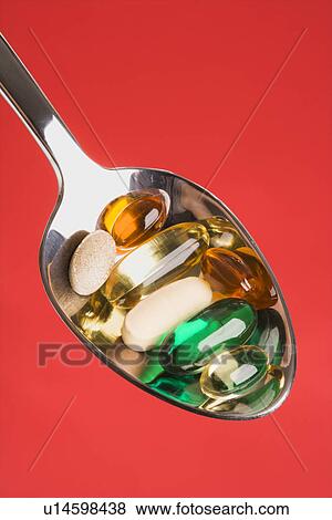Stock Photo - Spoonful of Pills. Fotosearch