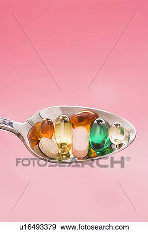 Stock Photo - Spoonful of Pills. Fotosearch