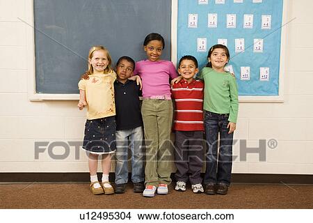 Students Standing in Classroom. View Large Photo Image Picture - Students Standing in Classroom. . Fotosearch