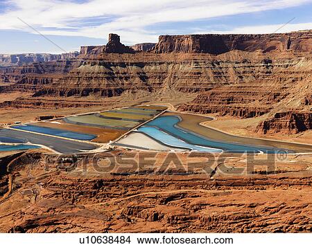 Picture - Tailing Ponds in Craggy Landscape. Fotosearch