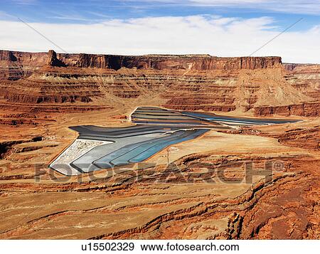 Tailing Ponds in Craggy Landscape View Large Photo Image Stock Photo - Tailing Ponds in Craggy Landscape. Fotosearch