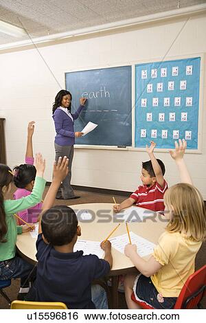 Stock Photograph - Teacher and Students. Fotosearch