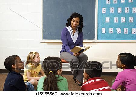Teacher Reading to Students View Large Photo Image Stock Image - Teacher Reading to Students. Fotosearch