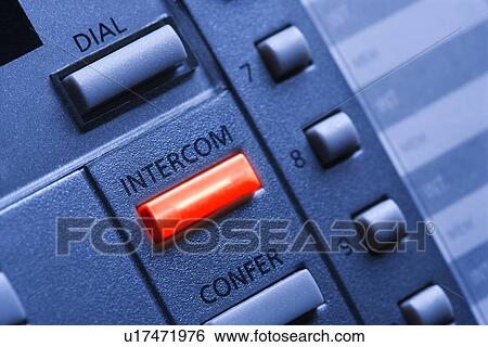 Stock Photograph - Telephone with Lit Intercom Button. Fotosearch