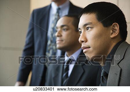 Stock Image - Three Businessmen. Fotosearch