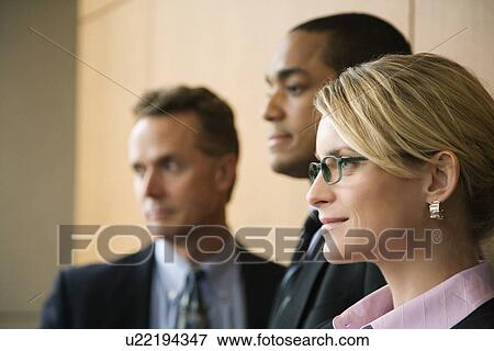Three Businesspeople View Large Photo Image Stock Photo - Three Businesspeople. Fotosearch
