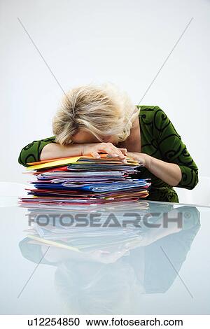 Tired businesswoman View Large Photo Image Stock Image - Tired businesswoman. Fotosearch
