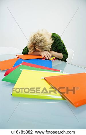 Tired businesswoman View Large Photo Image Stock Image - Tired businesswoman. Fotosearch