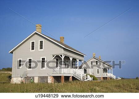 Stock Photo - Two Beachfront Homes. Fotosearch