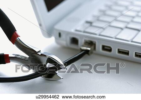 Wire Cutters Cutting Cable to Laptop View Large Photo Image Stock Image - Wire Cutters Cutting Cable to Laptop. Fotosearch
