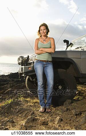 Woman by SUV at the Beach View Large Photo Image Stock Photography - Woman by SUV at the Beach. Fotosearch