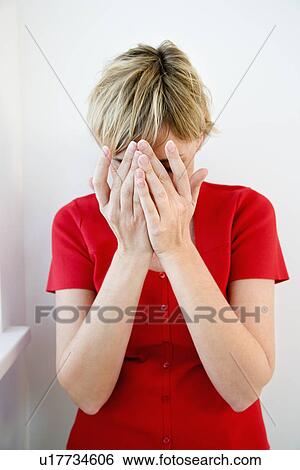 Woman hiding face View Large Photo Image Stock Photograph - Woman hiding face. Fotosearch