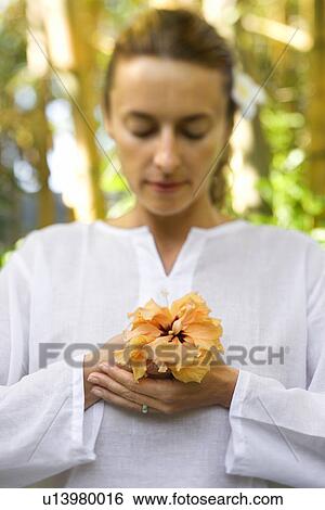 Woman Holding Flower View Large Photo Image Stock Photograph - Woman Holding Flower. Fotosearch