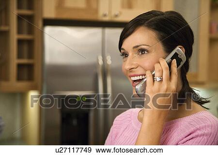 Woman on Cell Phone Smiling View Large Photo Image Stock Photo - Woman on Cell Phone Smiling. Fotosearch