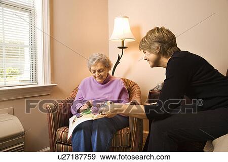 Woman Visiting Older Woman View Large Photo Image Stock Photo - Woman Visiting Older Woman . Fotosearch